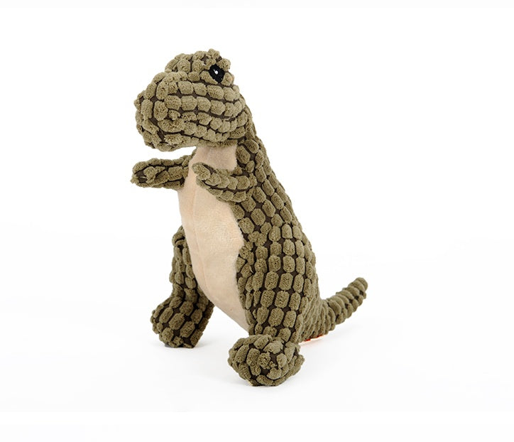 Golden retriever carrying an orange plush squeaky dinosaur dog toy
