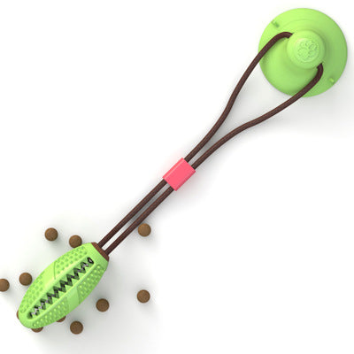 Green suction cup dog toy with tug rope and chew ball