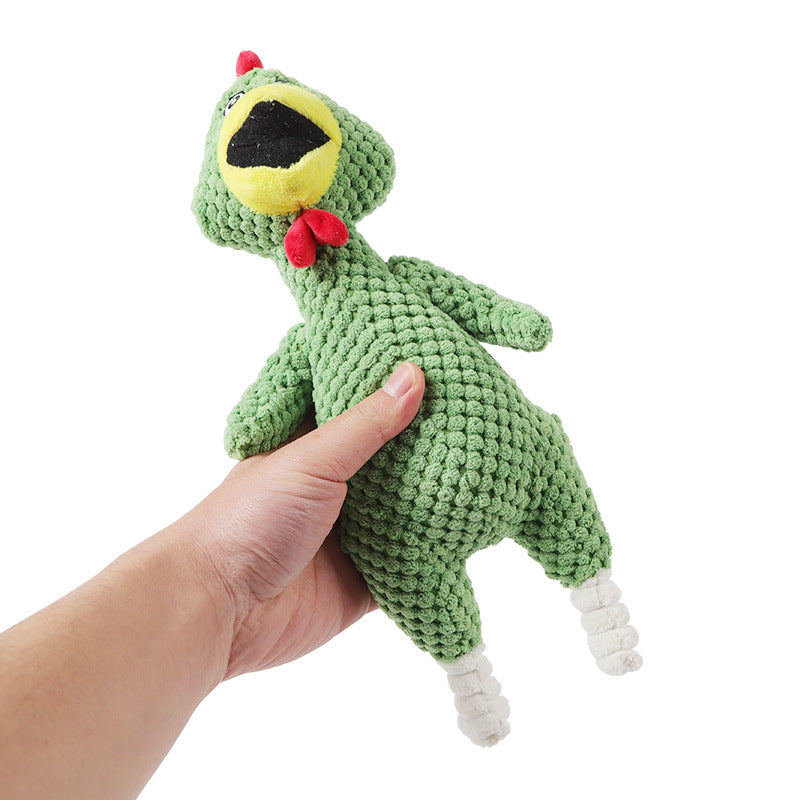 Hand holding a Lorzini squeaky plush chicken dog toy