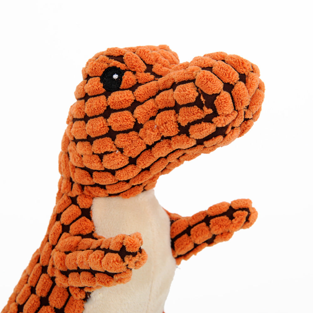 Soft corn-velvet squeaky T-Rex dog toy held in hand