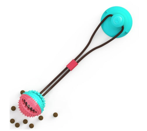 Coral and teal suction cup dog toy with textured teeth-cleaning ball