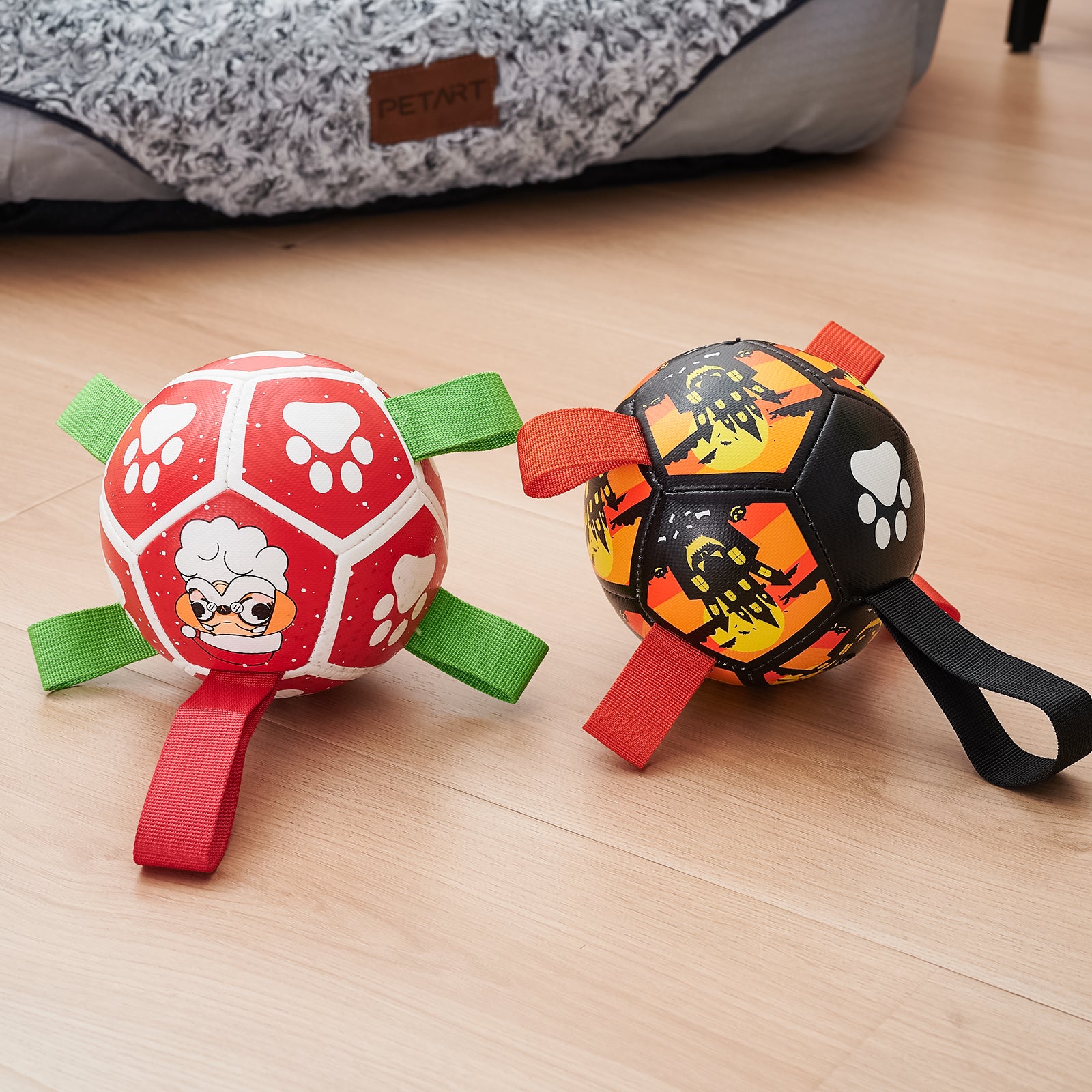 Dog playing with the Lorzini soccer ball with grab straps outdoors