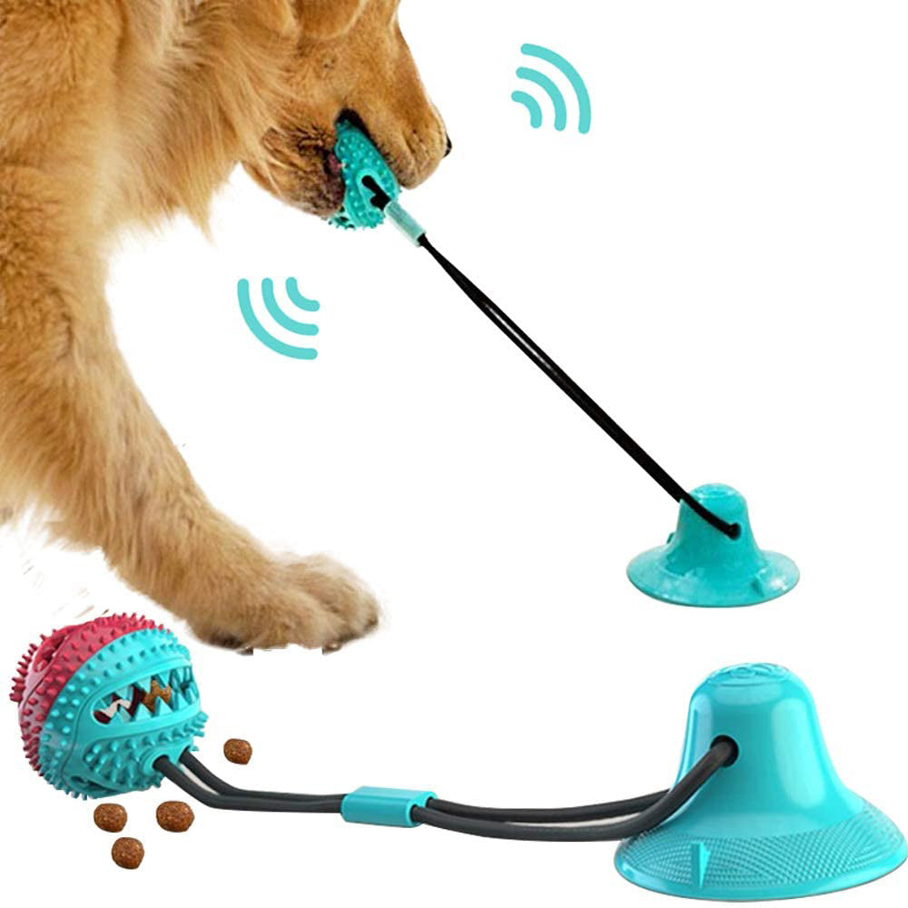 Lorzini suction cup dog toy with tug rope and treat-dispensing ball on the floor