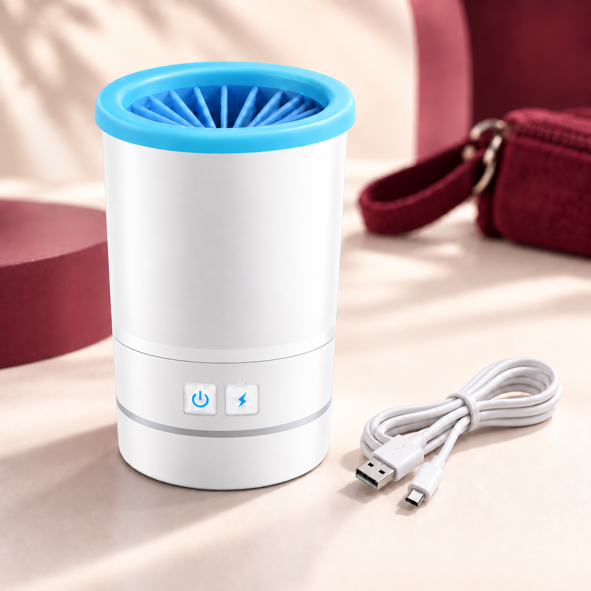 White Lorzini rechargeable dog paw cleaner with USB charging cable