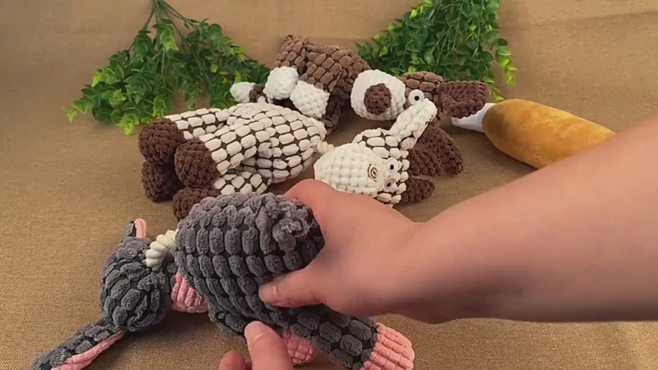Video: dog playing with a Lorzini squeaky corduroy donkey toy