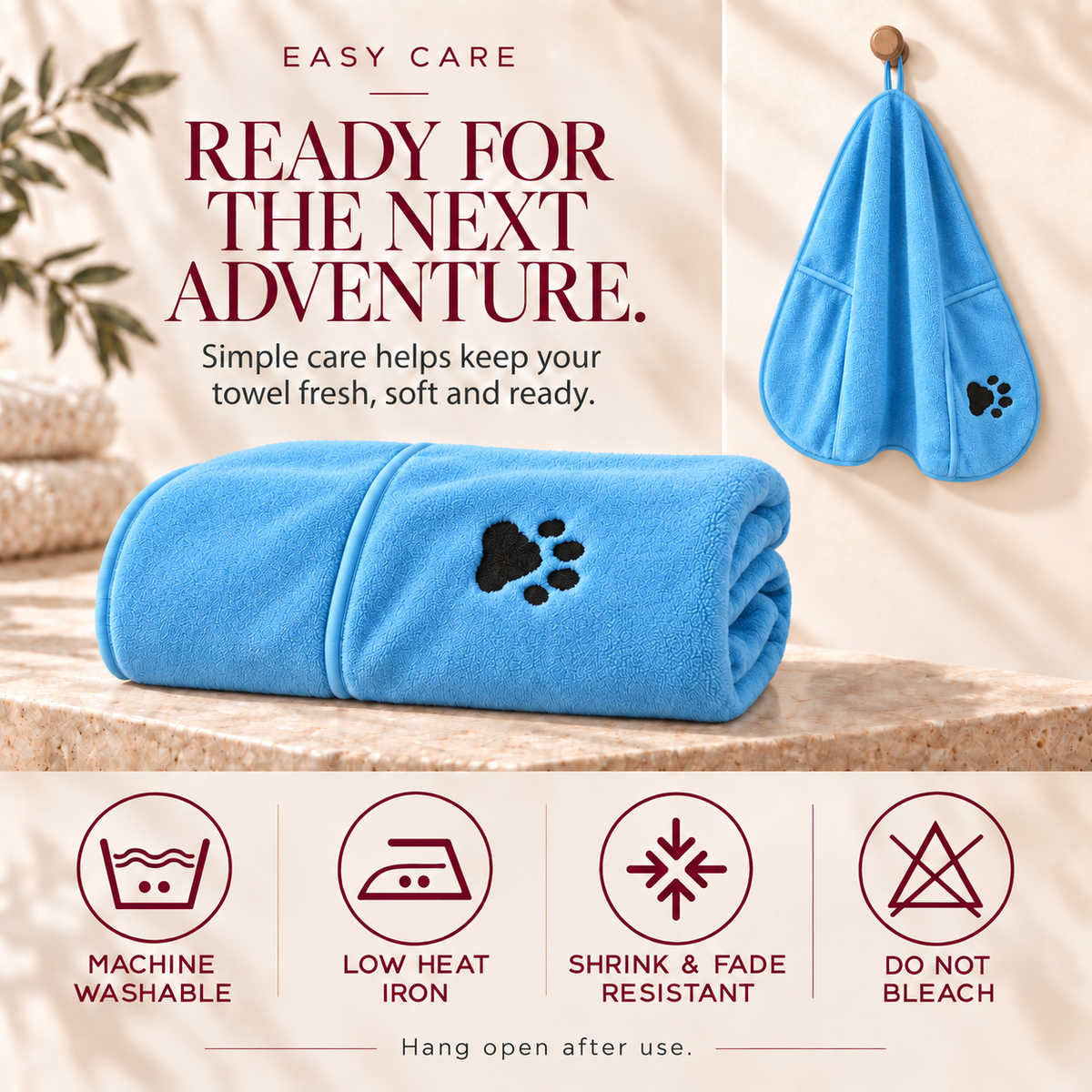 Sky blue Lorzini dog towel folded and hanging from its drying loop